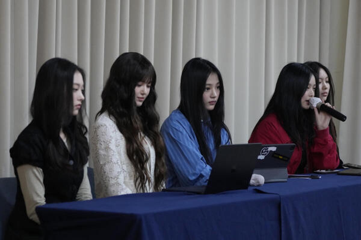 Members of South Korean K-Pop group NewJeans attend a press conference to declare contract termination with the band’s label citing multiple reasons including unfair treatment, in Seoul, South Korea, Thursday, Nov. 28, 2024. 